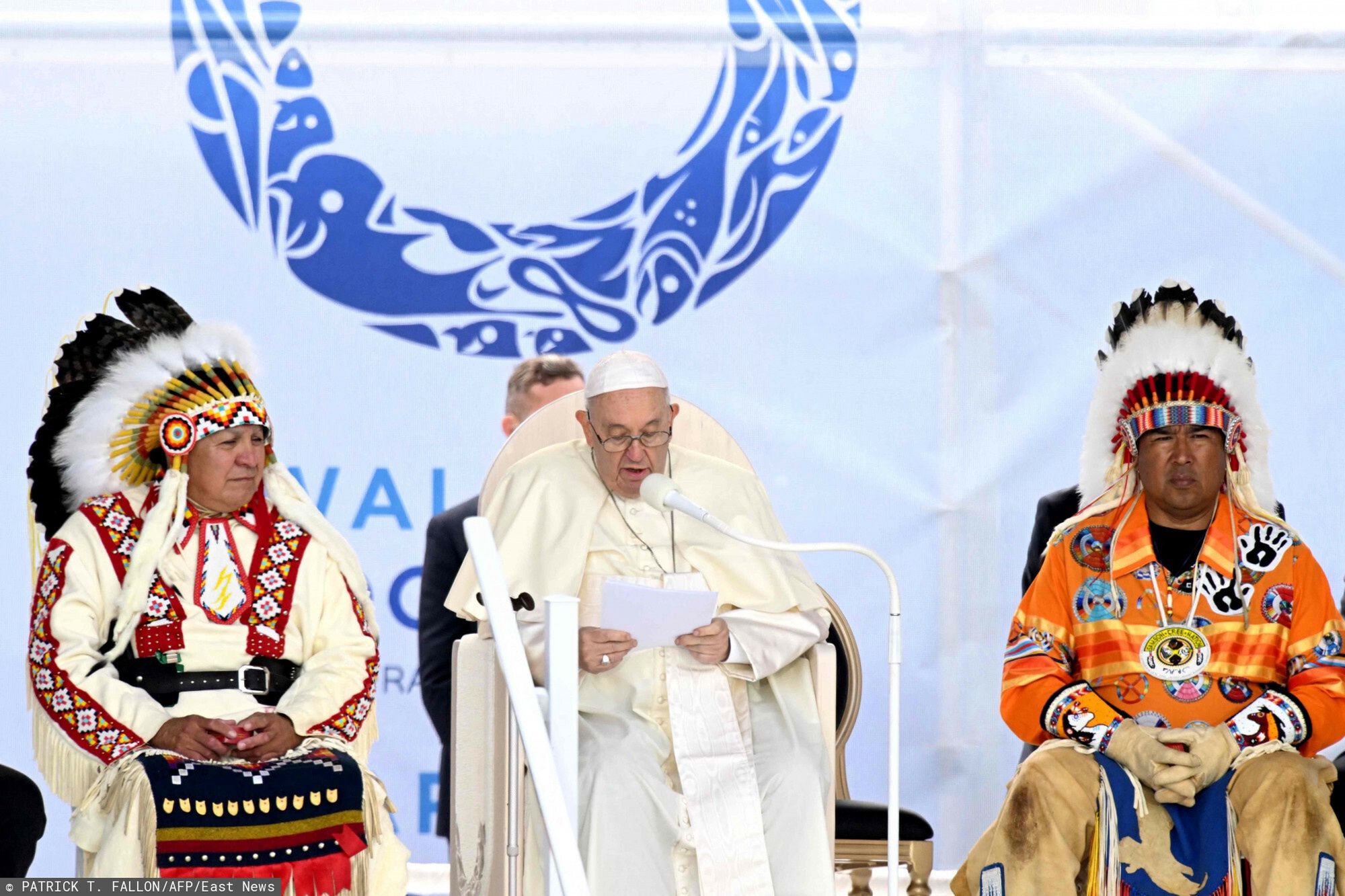 Temporary
Pope Francis (C) speaks to members of the Indigenous community at Muskwa Park in Maskwacis, Alberta, Canada, on July 25, 2022. - Pope Francis will make a historic personal apology Monday to Indigenous survivors of child abuse committed over decades at Catholic-run institutions in Canada, at the start of a week-long visit he has described as a "penitential journey." (Photo by Patrick T. FALLON / AFP)
PATRICK T. FALLON