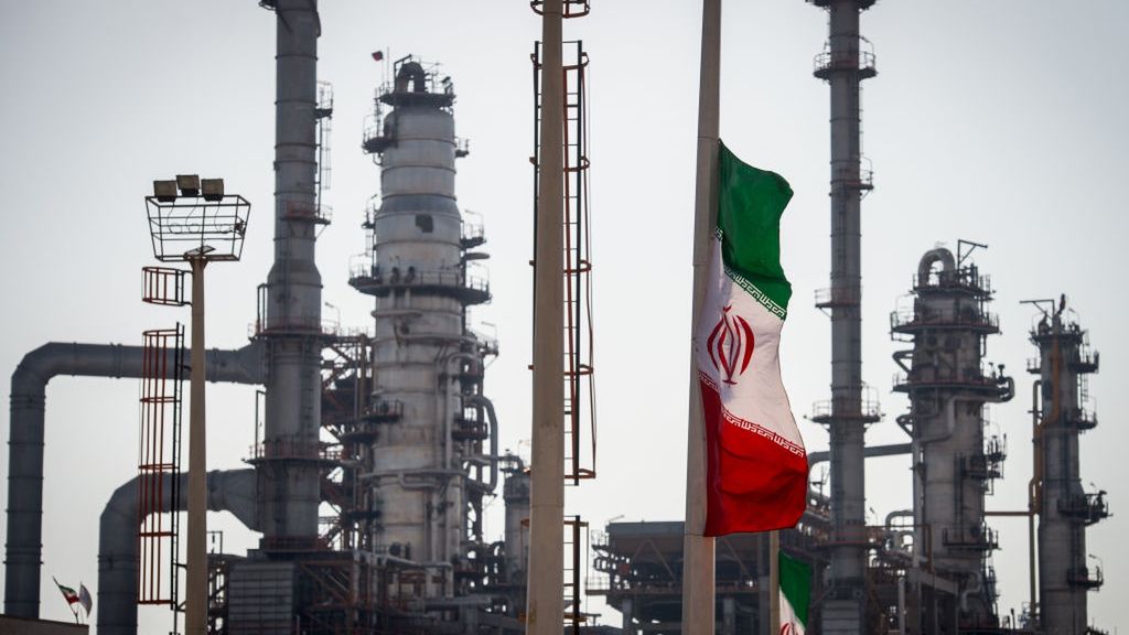 Iran To Meet Own Gasoline Needs After Persian Gulf Star Refinery Expansion
An Iranian national flag flies near gas condensate processing facilities in the new Phase 3 facility at the Persian Gulf Star Co. (PGSPC) refinery in Bandar Abbas, Iran, on Wednesday, Jan. 9. 2019. The third phase of the refinery begins operations next week and will add 12-15 million liters a day of gasoline output capacity to the plant, Deputy Oil Minister Alireza Sadeghabadi told reporters. Photographer: Ali Mohammadi/Bloomberg via Getty Images
Bloomberg
Eastern, Iranian, Crude Oil, EMEA, Fossil Fuels, Markets, Energy, Business Finance and Industry, Iran