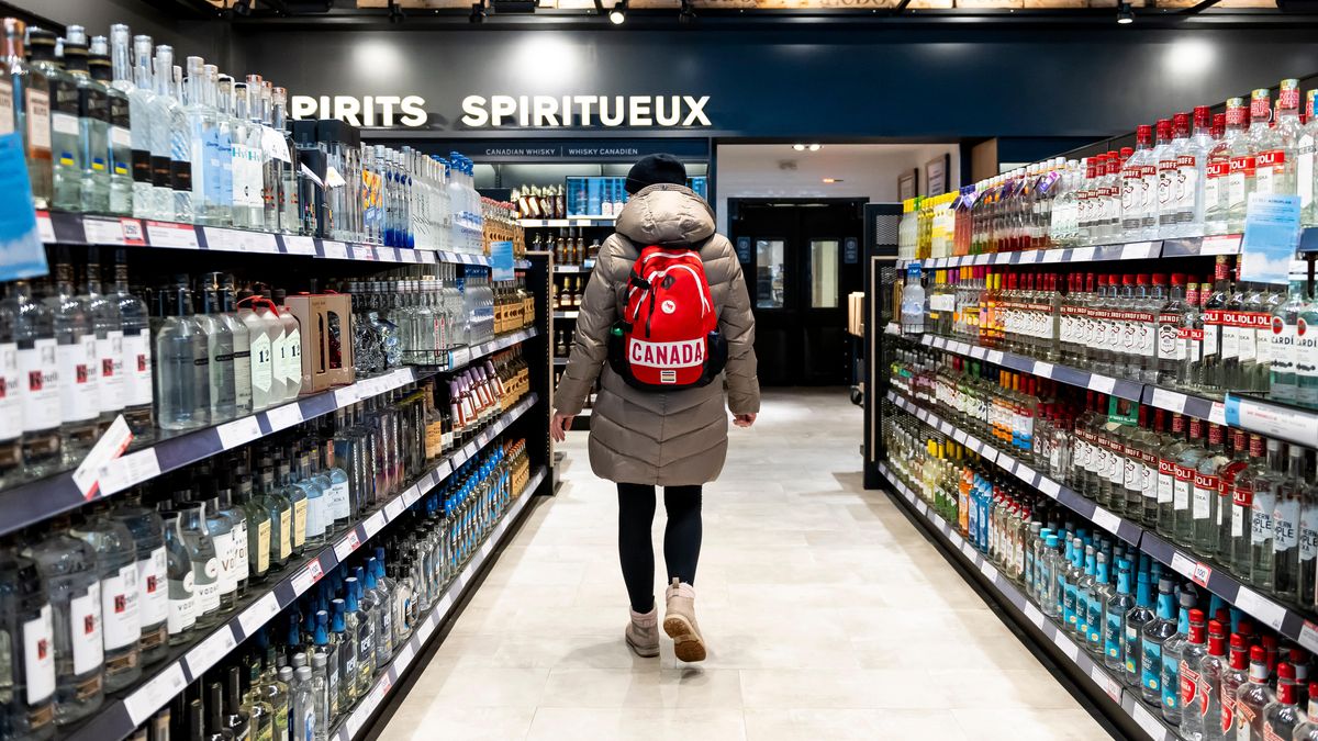 A shopper browses the spirit products at the Liquor Control Board of Ontario (LCBO) Queen's Quay store in Toronto, Ontario, Canada, on Tuesday, March 4, 2025. The Trump administration may announce a pathway for tariff relief on Mexican and Canadian goods covered by North America's free trade agreement as soon as Wednesday. Photographer: Christopher Katsarov Luna/Bloomberg via Getty Images