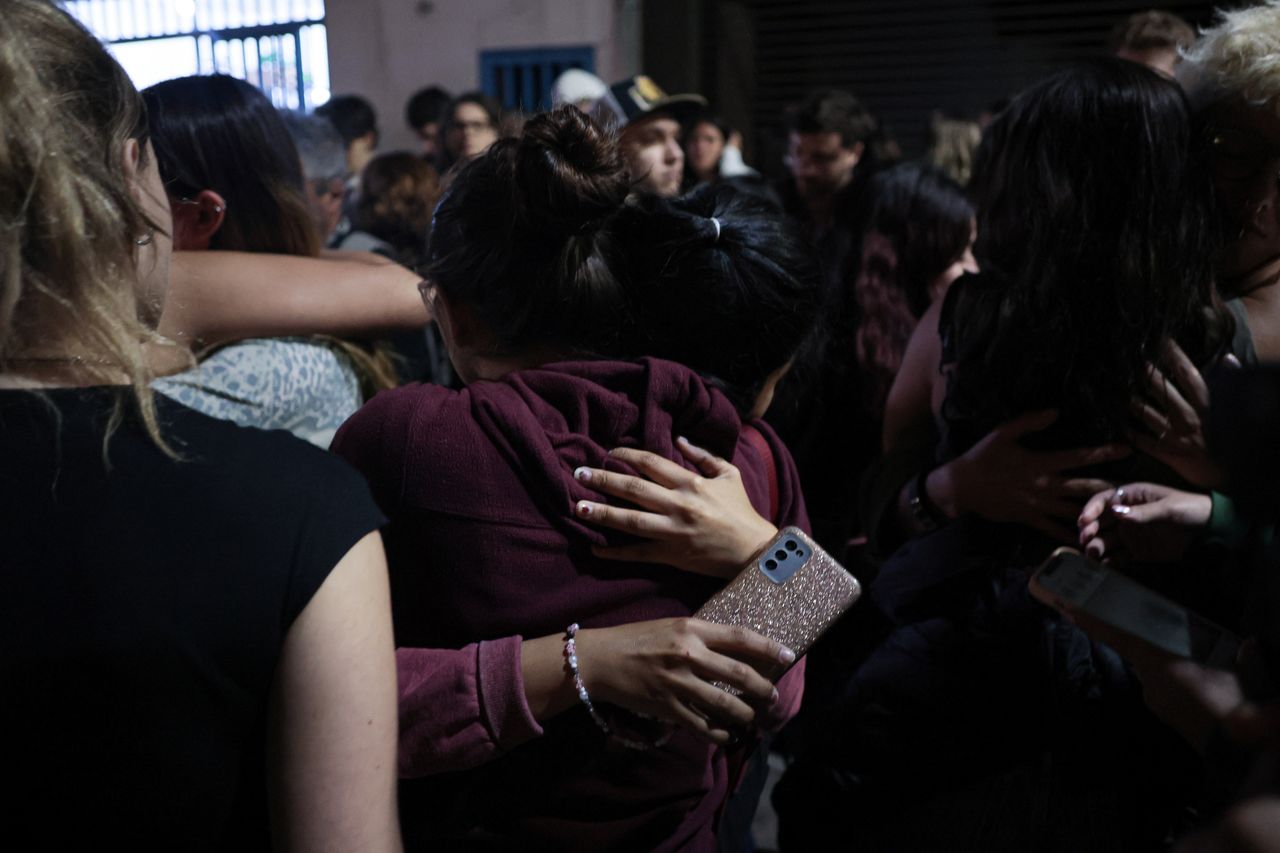 BUEONES AIRES, ARGENTINA - OCTOBER 16: Fans of One Direction and Liam Payne gathered outside the hotel to sing the band's songs and leave a candle at an improvised altar after British musician Liam James Payne, composer, guitarist, and former member of the band, died on Wednesday, October 16, 2024 in Bueones Aires, Argentina. He fell from the third floor of a hotel in the Palermo neighborhood of Buenos Aires, Argentina, according to police sources. (Photo by Luciano Gonzalez/Anadolu via Getty Images)