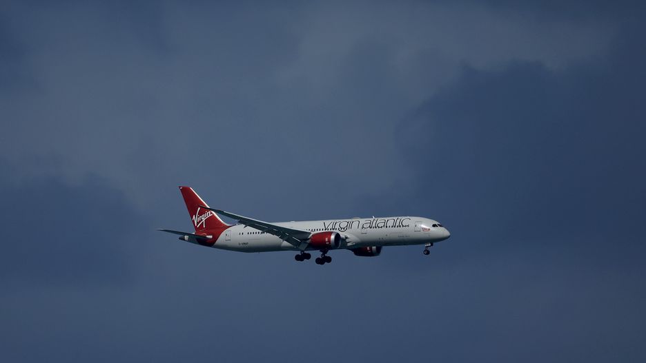 NASSAU, BAHAMAS - DECEMBER 03: A Virgin Atlantic Airlines Boeing 787 flies over the course on it's approach to Nassau International Airport during the third round of the 2022 Hero World Challenge at Albany Golf Course on December 03, 2022 in Nassau, Bahamas. (Photo by David Cannon/Getty Images)