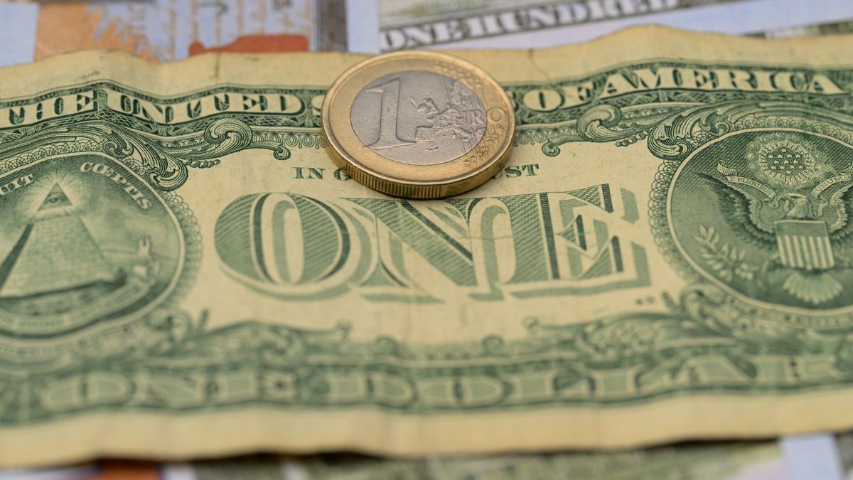 The US one dollar bill lies beside the EU 1 EURO coin in this photo illustration in Brussels, Belgium, on January 4, 2025. (Photo by Jonathan Raa/NurPhoto via Getty Images)