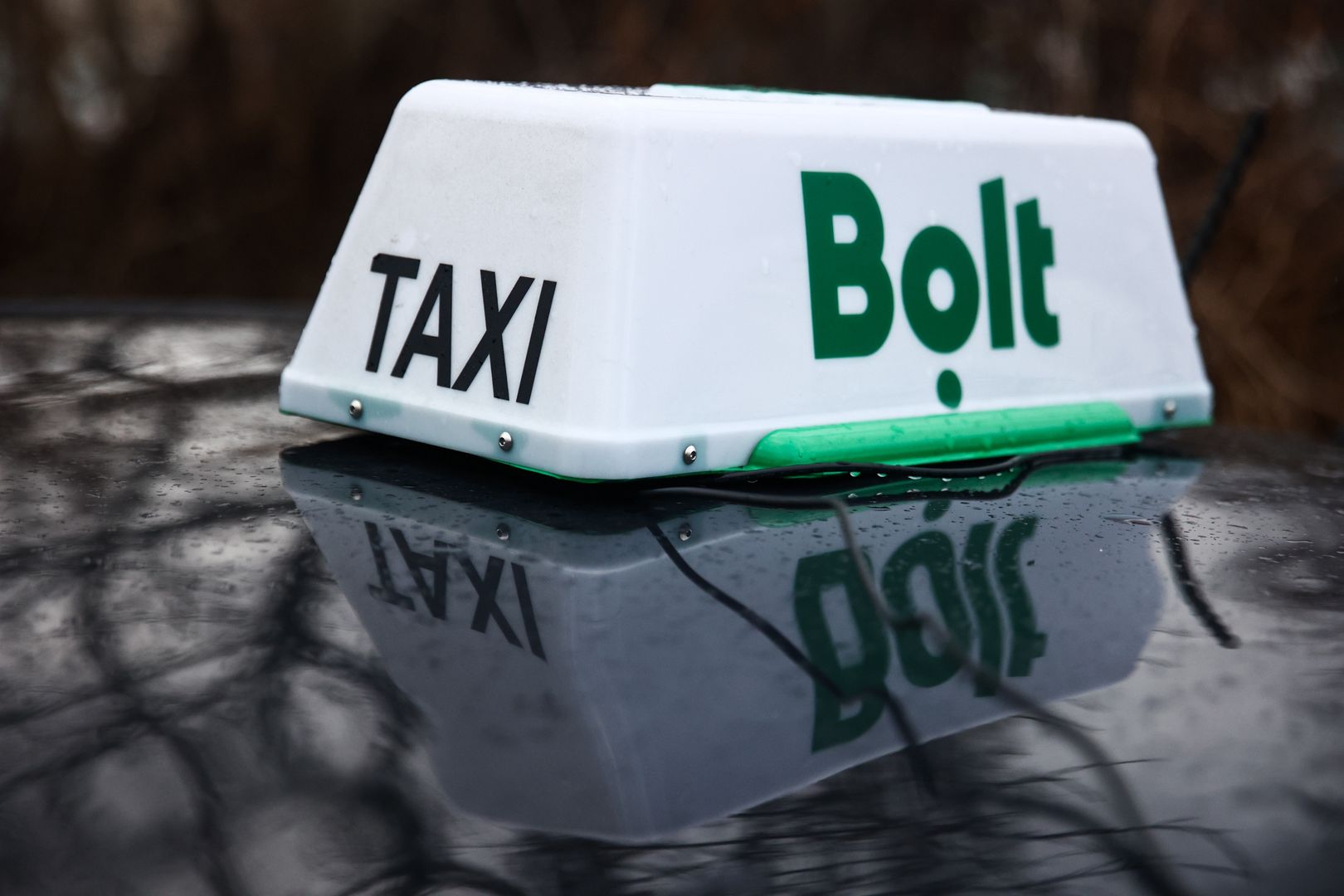 Bolt taxi sign is seen on a car in Krakow, Poland on January 24, 2024. (Photo by Jakub Porzycki/NurPhoto via Getty Images)