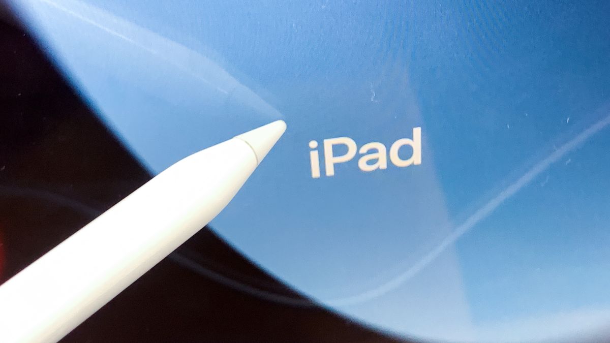 iPad logo displayed on a screen and Apple Pencil are seen in this illustrations photo taken at the store in Krakow, Poland on September 7, 2022. (Photo by Jakub Porzycki/NurPhoto via Getty Images)