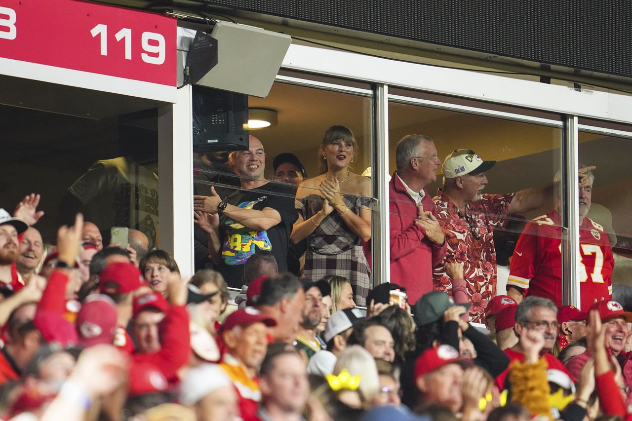 KANSAS CITY, MO - OCTOBER 07:  Taylor Swift looks on from the stands during an NFL football game between the New Orleans Saints and the Kansas City Chiefs at GEHA Field at Arrowhead Stadium on October 7, 2024 in Kansas City, Missouri. (Photo by Cooper Neill/Getty Images)