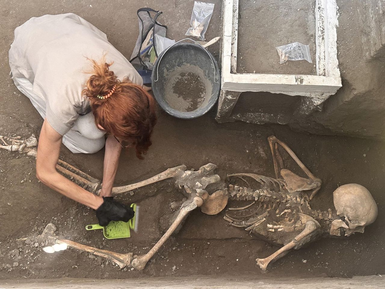 Archaeologists uncover poignant remains of Vesuvius victims in Pompeii