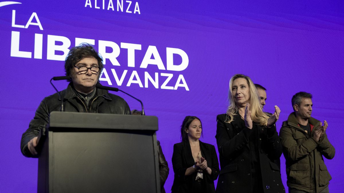 Javier Milei, Argentina's president, left, speaks during an election night rally for the Libertad Avanza party in La Plata, Buenos Aires province, Argentina, on Sunday, Sept. 7, 2025. Milei vowed no changes to his free-market economic program after a resounding defeat on Sunday to the center-left Peronist opposition in the province of Buenos Aires. Photographer: Anita Pouchard Serra/Bloomberg via Getty Images