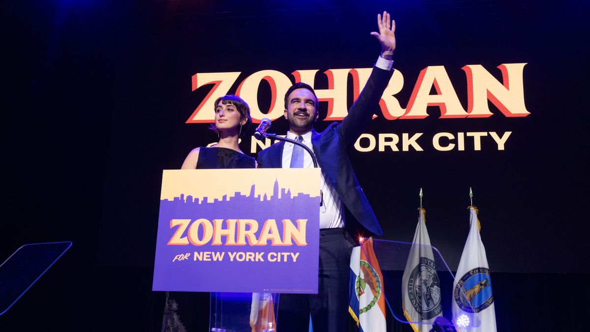 NEW YORK, NEW YORK - NOVEMBER 04: New York City Democratic mayoral candidate Zohran Mamdani waves with his wife Rama Duwaji (L) after delivering remarks at his election night watch victory party at the Brooklyn Paramount on November 4, 2025 in the Brooklyn borough of New York City. Mamdani defeated Independent candidate Andrew Cuomo and Republican candidate Curtis Sliwa in the election for New York City mayor.  (Photo by Andrew Lichtenstein/Corbis via Getty Images)