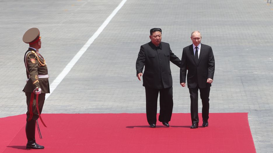 PYONGYANG, NORTH KOREA - JUNE 19: (RUSSIA OUT) Russia's President Vladimir Putin (R) and North Korean Supreme Leader Kim Jong Un (C) attend a welcoming ceremony, on June 19, 2024, in Pyongyang, North Korea. Russian President Vladimir Putin is in North Korea for a two-day visit. (Photo by Contributor/Getty Images)