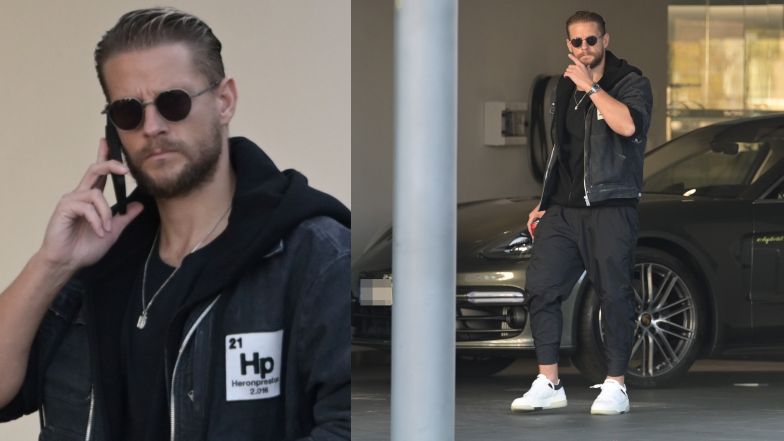 Sebastian Fabijański odbiera z salonu porsche