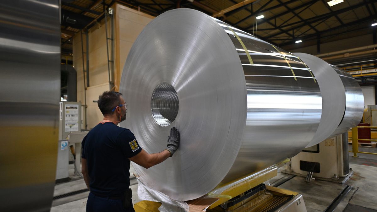 A worker inspects a roll of aluminium sheet used for beverage can production at the Ball Packaging Europe Ltd. manufacturing plant in Belgrade, Serbia, on Tuesday, Sept. 24, 2024. The trajectory of Fed easing is important for metals, which have wavered in recent months on uncertainty over the state of the US economy and concerns over softness in global factory activity. Photographer: Oliver Bunic/Bloomberg via Getty Images