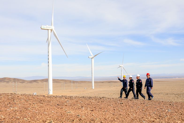 Border police conduct an enterprise safety inspection on a wind power plant in Altay, Xinjiang, China, on November 5, 2024. (Photo by Costfoto/NurPhoto via Getty Images)