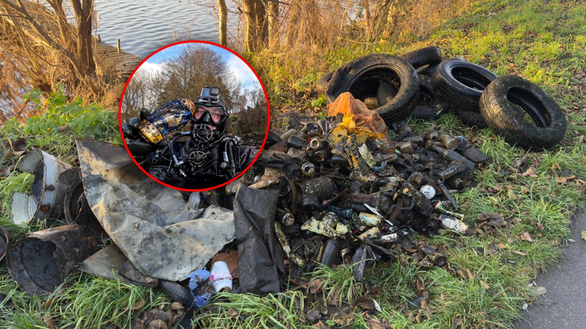 Nurek wyjmuje śmieci z dna jeziora.