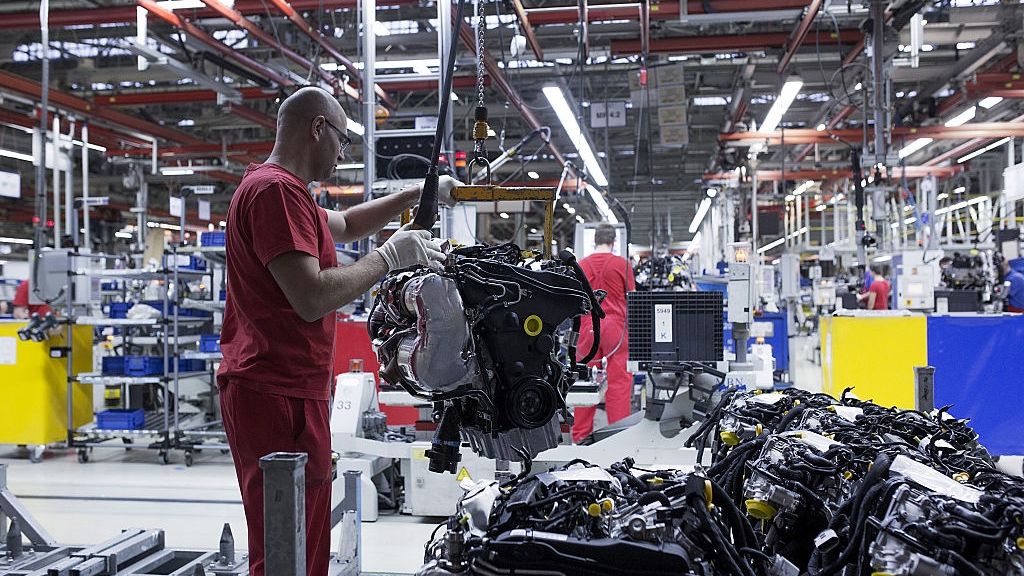 Volkswagen AG Automobile Manufacture In Poland
A worker uses a hoist to move a new turbo diesel engine (TDI) ahead of fitting to a Volkswagen AG Caddy van on the production line at the VW plant in Poznan, Poland, on Wednesday, Dec. 22, 2015. Volkswagen's struggles mark a stark contrast to a buoyant recovery in Europe's auto market. Photographer: Bartek Sadowski/Bloomberg via Getty Images
Bloomberg
Europe, EMEA, Poland, Polish, Eastern Europe, Automaker, Autos, Auto Industry, Auto, Vehicle, Plant, Carmaker, Cars, Factory, Worker, Car, Industry: Industrial, Laborer, Transport, Labor