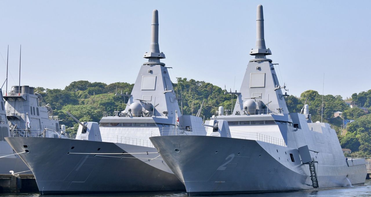 Two Japanese Mogami-class frigates