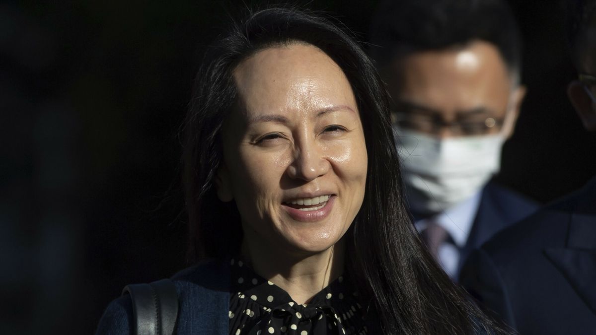 TemporaryMeng Wanzhou, chief financial officer of Huawei, smiles as she leaves her home in Vancouver on Friday, Sept. 24, 2021.  (Darryl Dyck/The Canadian Press via AP)CP