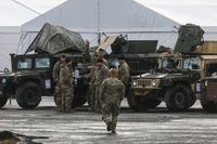 U.S. Military Base At Arlamow Airport In Poland
U.S. soldiers of the 82nd Airborne Division and military vehicles are seen at the temporary military base for U.S. troops established at the Arlamow Airport. Wola Korzeniecka, the Podkarpackie Voivodeship, Poland on February 23, 2022. U.S. troops have arrived as reinforcements for its various NATO allies in Eastern Europe, including Poland, as Russian invasion of Ukrain has begun. (Photo by Beata Zawrzel/NurPhoto via Getty Images)
NurPhoto
polish, european, wola, korzeniecka, arlamow, soldier, vehicle, deployment, transport, russian, invasion, united, states, of, america, american, base, troops, u.s. soldiers, u.s. troops, various nato allies, temporary military base, military vehicles, arlamow airport, wola korzeniecka, russian invasion, reinforcements, ukrain
