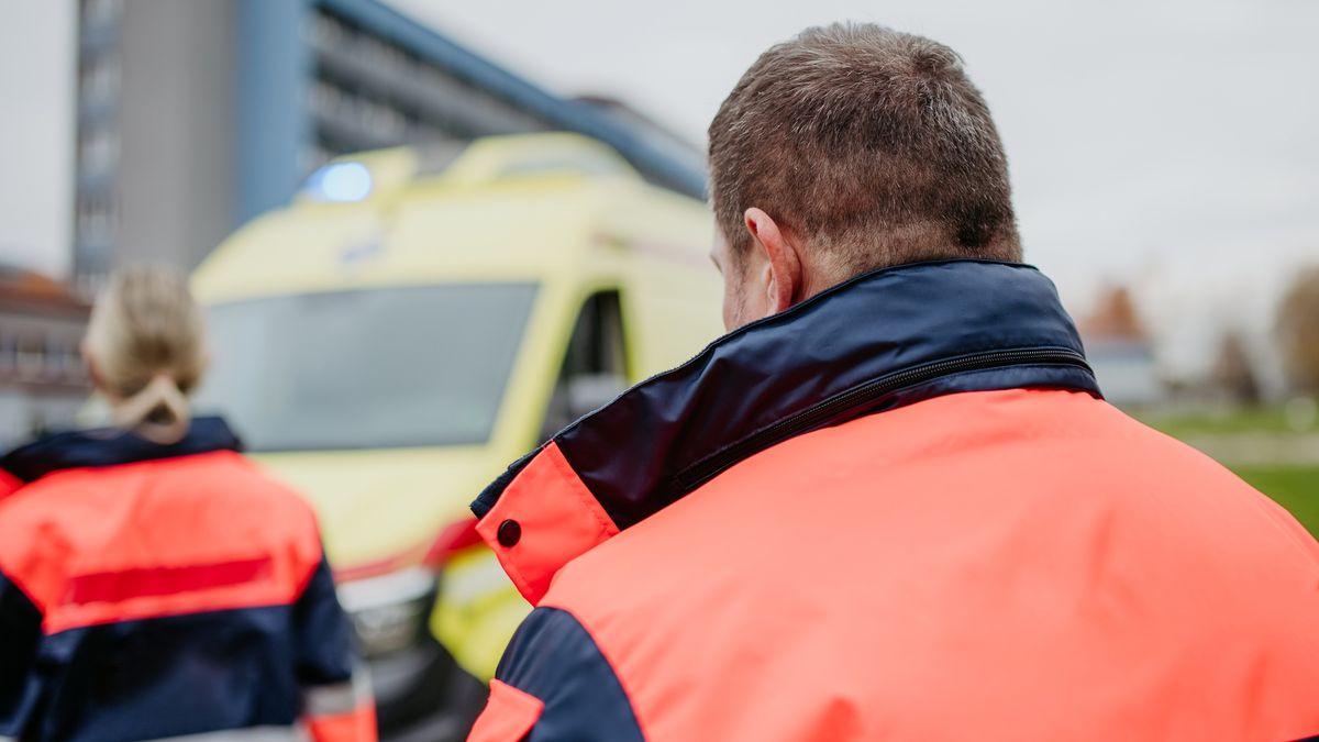 Rear view of rescuers getting in to ambulance car, preparing for rescue operation.
Rear view of rescuers getting in to ambulance car, preparing for a rescue operation.
Halfpoint