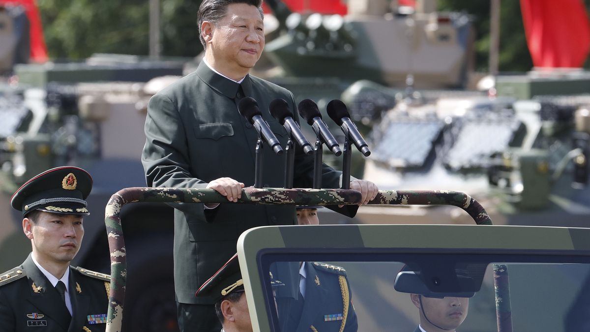 Chinese President Xi Jinping Visits of the People's Liberation Army's Hong Kong Garrison
Xi Jinping, China's president, rides in a vehicle as he reviews People's Liberation Army (PLA) troops at the Shek Kong Barracks in Hong Kong, China, on Friday, June 30, 2017. Xi sought to reassure a divided Hong Kong of Chinas continued support for the former British colony, as pro-democracy protesters struggled to be heard behind road blocks and police lines. Photographer: Anthony Kwan/Bloomberg via Getty Images
Bloomberg
East Asian, HKHANDOVER20, TOPNEWS, PLA, Military, Politics, Army, Government