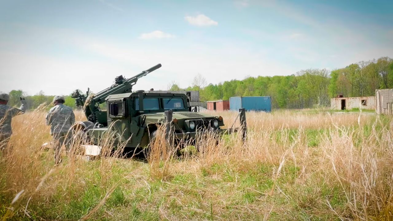 The ultralight 2-CT Hawkeye howitzer caliber 105 mm mounted on the chassis of an HMMWV off-road vehicle.