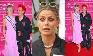 Michał Wiśniewski oślepia śnieżnobiałym uśmiechem, dokazując na ściance z Mrs. Poland International 2024. Co na to Mandaryna? (ZDJĘCIA)
