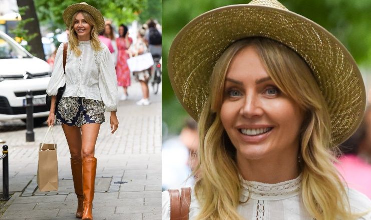 Długonoga Agnieszka Woźniak-Starak wychodzi z pracy