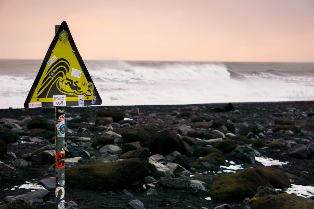 Warning signs on Reynisfjara beach