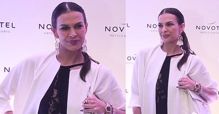 Ulizana 37-letnia szafiarka pozuje na ściance