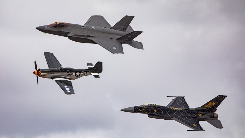 EL CENTRO, CALIFORNIA - MARCH 11: (Top to Bottom) An F-35 Lightning II, P-51 Mustang, and F-16 Fighting Falcon perform the Heritage Flight during the 2023 NAF El Centro Air Show at Naval Air Facility El Centro on March 11, 2023 in El Centro, California. (Photo by Daniel Knighton/Getty Images)