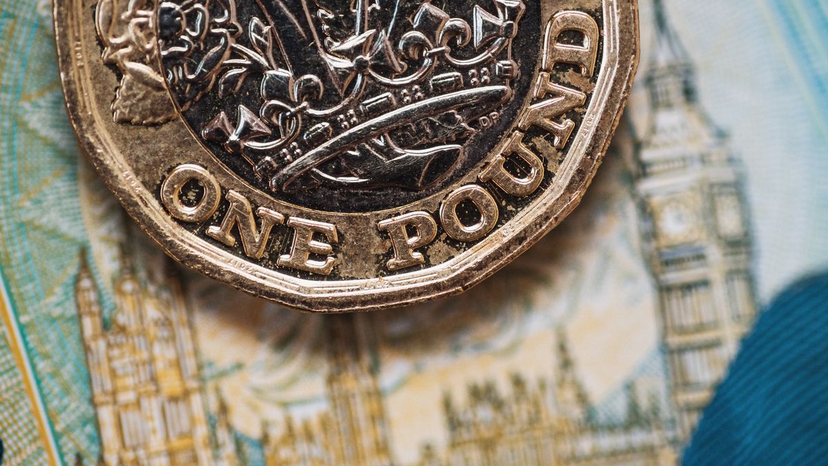 Detail of a One Pound (GBP) coinDetail of a One Pound (GBP) coin. The Big Ben design in the background comes from a 5 GBP banknote.MarioGuti