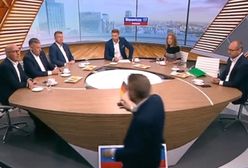 "Błazenada. Kabarecik". Chodzili wokół stołu w TVP z niemiecką flagą