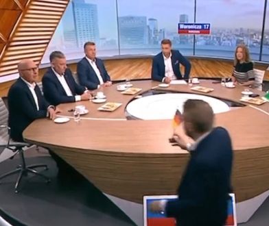 "Błazenada. Kabarecik". Chodzili wokół stołu w TVP z niemiecką flagą