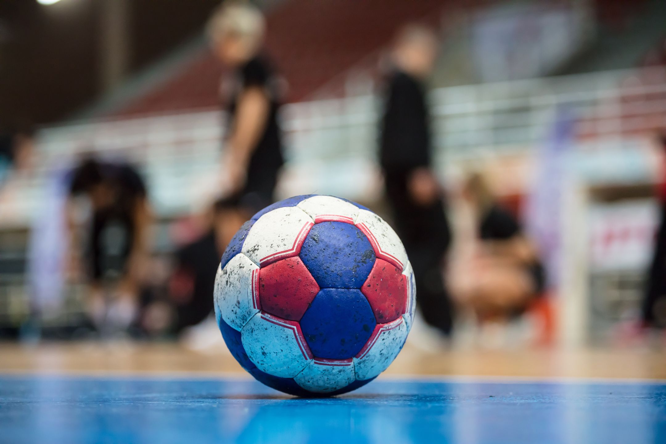Handball ball on court' s floor. Ready for the match. Blurred referees, coaches and athletes and field background.
handball, ball, sport, court, floor, match, team, goal, closeup, athletes, referees, coaches, field, play, athletic, recreation, competition, trainer, championship, exercise, indoor,  lifestyle, game, success, leisure, power, people, energy, active, action, dynamic, recreational, practice, physical, moving, attack, aggression, high, shoot, hit, throw, cup, final, background, blurred, dirty, group, league, aim, player,, handball, ball, sport, court, floor, match, team, goal, closeup, athletes, referees, coaches, field, play, athletic, recreation, competition, trainer, championship, exercise, indoor, lifestyle, game, success, leisure, power, people, energy, active, action, dynamic, recreational, practice, physical, moving, attack, aggression, high, shoot, hit, throw, cup, final, background, blurred, dirty, group, league, aim, player