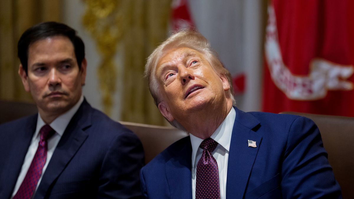 Marco Rubio, US secretary of state, left, and US President Donald Trump during a cabinet meeting at the White House in Washington, DC, US, on Tuesday, Aug. 26, 2025. Trump said he was prepared for a legal fight with Federal Reserve Governor Lisa Cook after he moved to oust her from her post following allegations that she falsified mortgage documents. Photographer: Aaron Schwartz/CNP/Bloomberg via Getty Images
