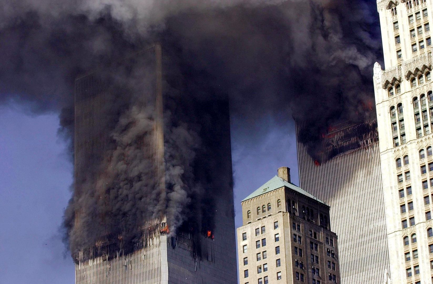 ALL
FFM05 - 2020902 -NEW YORK, UNITED STATES : (FILES) A file photo from 11 September 2001 showing the twin towers of World Trade Center burning after two planes crashed into each building in New York. Last year's terrorist attacks on the World Trade Center and the Pentagon, killing about 3.000 people, lead to the massive strike on Osama bin-Laden's terrorist network al-Qaida in Afghanistan and all over the world. (ORIGINALLY ISSUED AS JFK02)     EPA PHOTO    AFPI   FILES / STAN HONDA
STAN HONDA