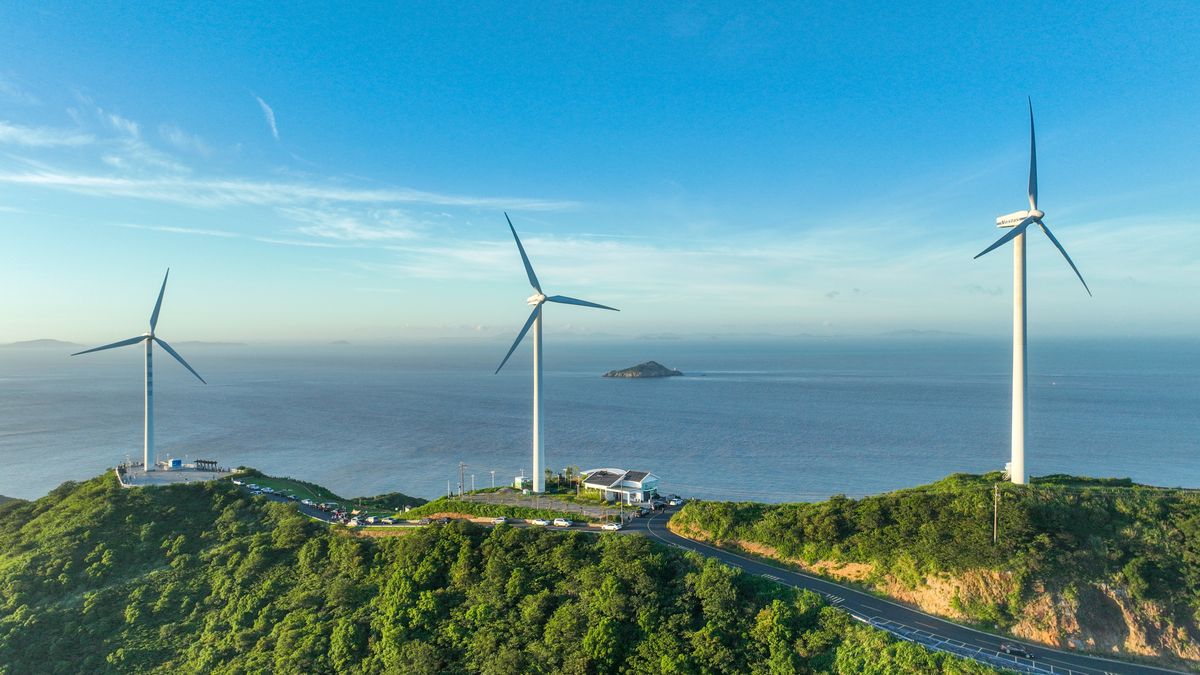 ZHOUSHAN, CHINA - AUGUST 14, 2025 - The wind turbines at Qushan Island Wind Farm are rotating under the effect of sea breeze in Zhoushan City, Zhejiang Province, China on August 14, 2025. (Photo credit should read CFOTO/Future Publishing via Getty Images)