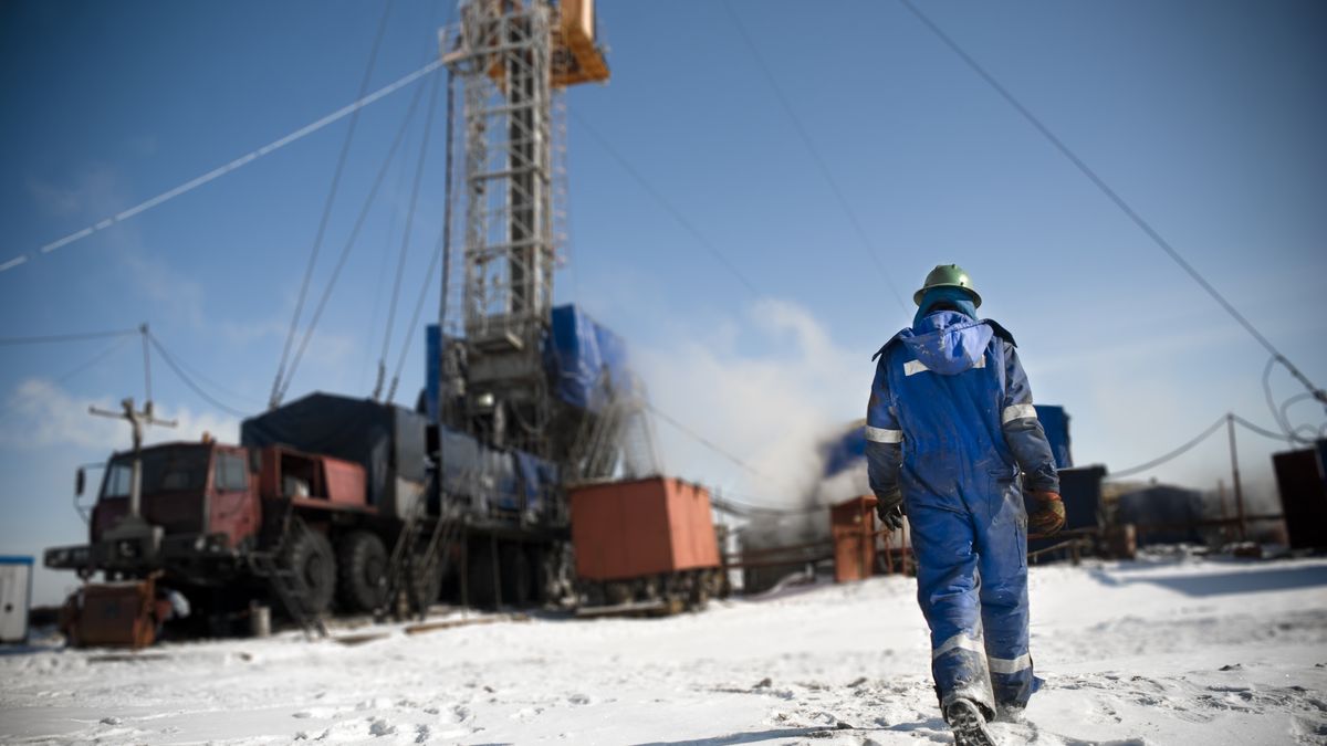 Man in a blue jumpsuit walking onto snowy construction site
An engineer is walking towards the drilling rig.
iznashih
Borehole, Fuel and Power Generation, Oil Industry, Oil Field, Men, Mining, Engineering, Oil Well, Drilling Rig, Well, Spinning, Color Image, Oil Rig, Energy, Rusty, Blue, Steel, Metal, Industry, Technology, Outdoors, Manual Worker, Engineer, People, Siberia, Day, Oil, Sky, Industrial Equipment, Equipment, oilfield, on shore, On-Shore, steel construction, Metal Construction, People, Industry, Oilman, Drilling
