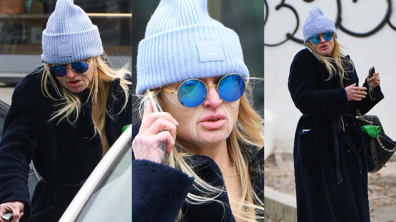 Monika Olejnik oklejona plastrami spaceruje po mieście