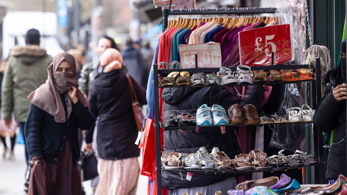 Shoes for sale outside a shop in the Tower Hamlets borough of London, UK, on Friday, March 15, 2024. UK headline inflation data due out Wednesday will likely drop back swiftly in February to 3.4% from 4% in January. Photographer: Chris Ratcliffe/Bloomberg via Getty Images