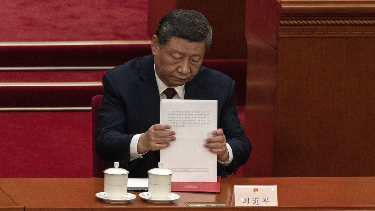 BEIJING, CHINA - MARCH 11: Chinese President Xi Jinping organizes his papers at the closing session of the National Peoples Congress, or NPC, at the Great Hall of the People on March 11, 2025 in Beijing, China. China's annual political gathering known as the Two Sessions convenes leaders and lawmakers annually to set the government's agenda for domestic economic and social development for the year.(Photo by Kevin Frayer/Getty Images)