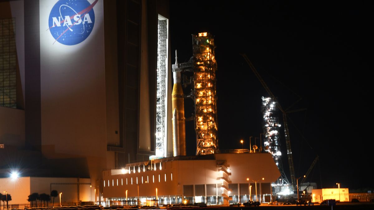 CAPE CANAVERAL, FLORIDA, UNITED STATES - FEBRUARY 25: NASAâs Artemis II Space Launch System (SLS) rocket with the Orion spacecraft is rolled back from pad 39B to the Vehicle Assembly Building (VAB) at the Kennedy Space Center on February 25, 2026 in Cape Canaveral, Florida. The rocket, which will launch with a crew of four on a journey around the moon as early as April, was found to have a helium flow issue to the rocketâs upper stage which will be repaired while in the VAB. (Photo by Paul Hennesy/Anadolu via Getty Images)