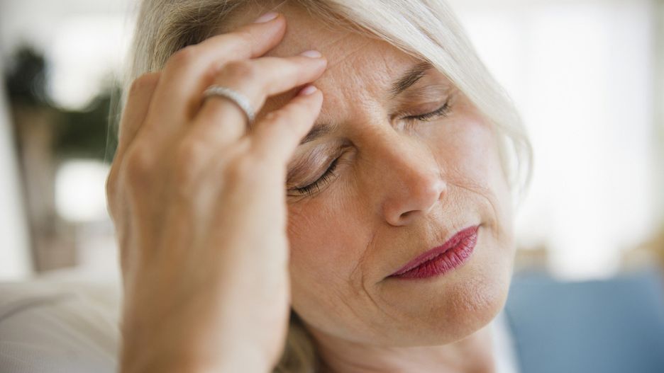 Senior woman with headache