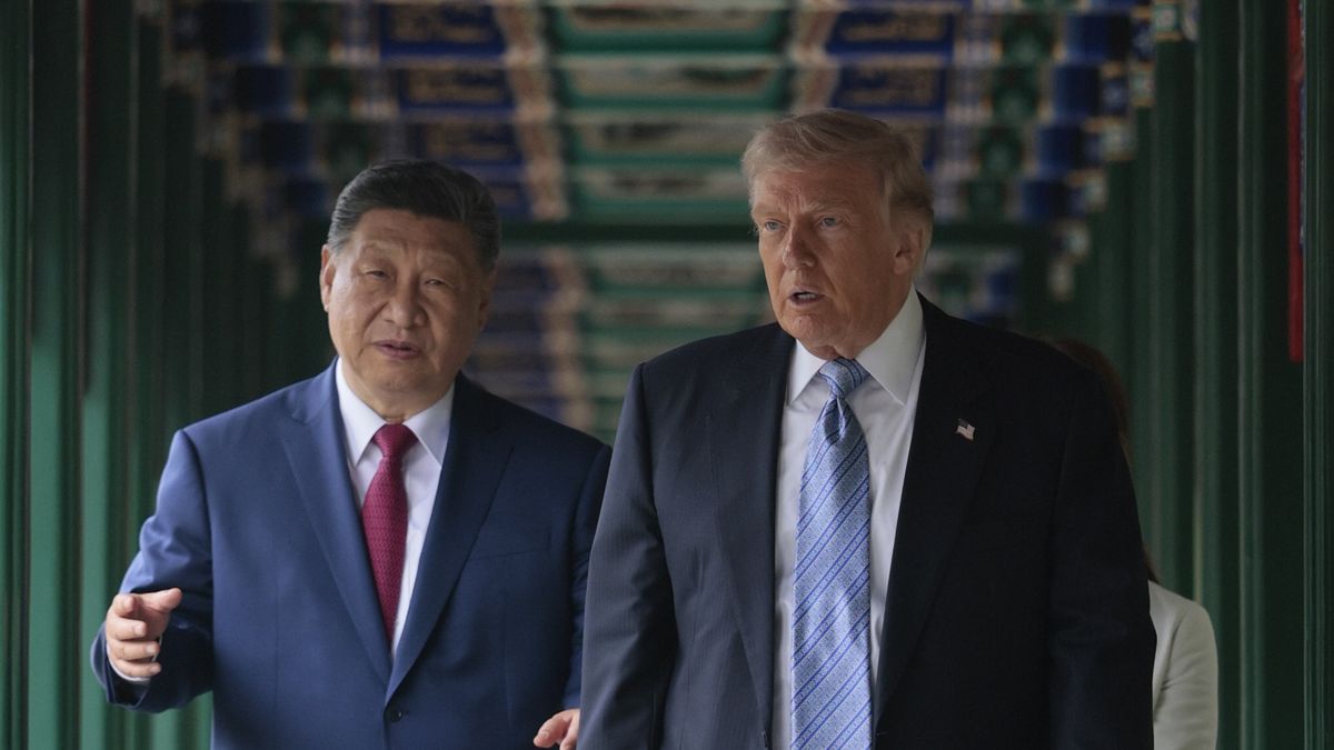 BEIJING, CHINA - MAY 15: U.S. President Donald Trump and Chinese President Xi Jinping tour Zhongnanhai Garden on May 15, 2026 in Beijing, China. Trump and other U.S. officials are finishing up a visit intended to address the Iran conflict, trade imbalances, and the Taiwan situation while establishing new bilateral boards for economic and AI oversight.  (Photo by Evan Vucci-Pool/Getty Images)
