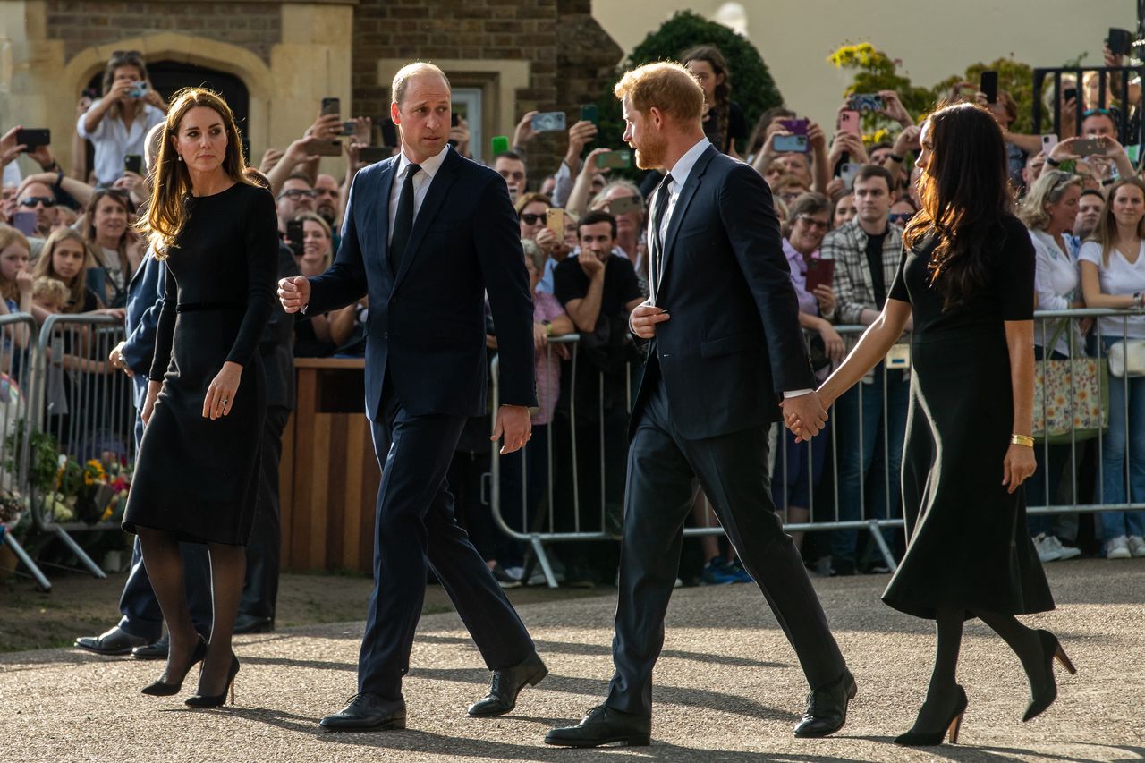 Prince William and Catherine, the new Prince and Princess of Wales, accompanied by Prince Harry and Meghan, the Duke and Duchess of Sussex, proceed to greet well-wishers outside Windsor Castle on 10th September 2022 in Windsor, United Kingdom. Queen Elizabeth II, the UK's longest-serving monarch, died at Balmoral aged 96 on 8th September 2022 after a reign lasting 70 years. (photo by Mark Kerrison/In Pictures via Getty Images)