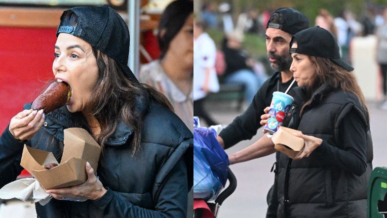 Eva Longoria zajada się corn dogiem w Disneylandzie