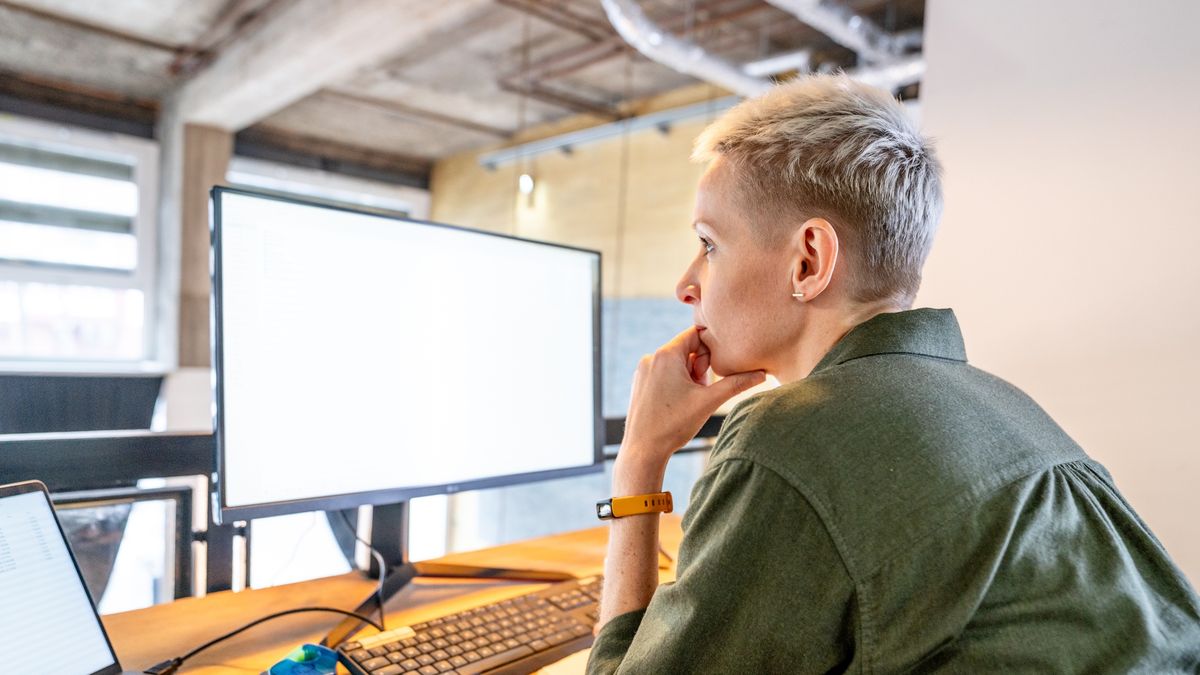 Office woman working concentrated at her desk in front of the computer monitor.
Image of a woman sitting at her desk in front of the computer monitor very pensive and concentrated. One person, indoors, office location.
princigalli