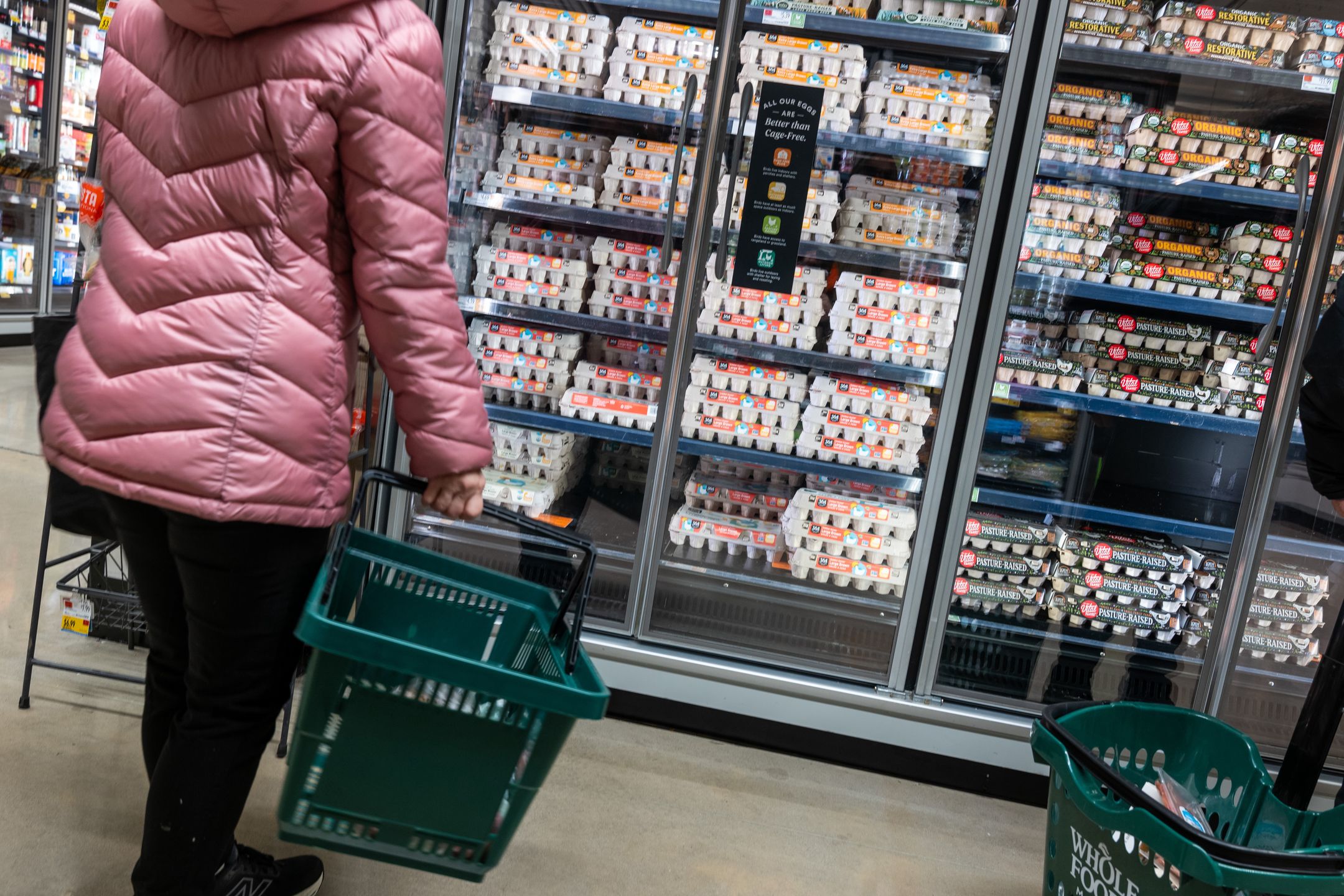 NEW YORK, NEW YORK - DECEMBER 17:  A person shops for eggs at a Whole Foods Market grocery store on December 17, 2024 in New York City. Grocery prices have recently seen their most significant monthly gain since January of 2023 with egg prices rising 8.2% alone. (Photo by Spencer Platt/Getty Images)