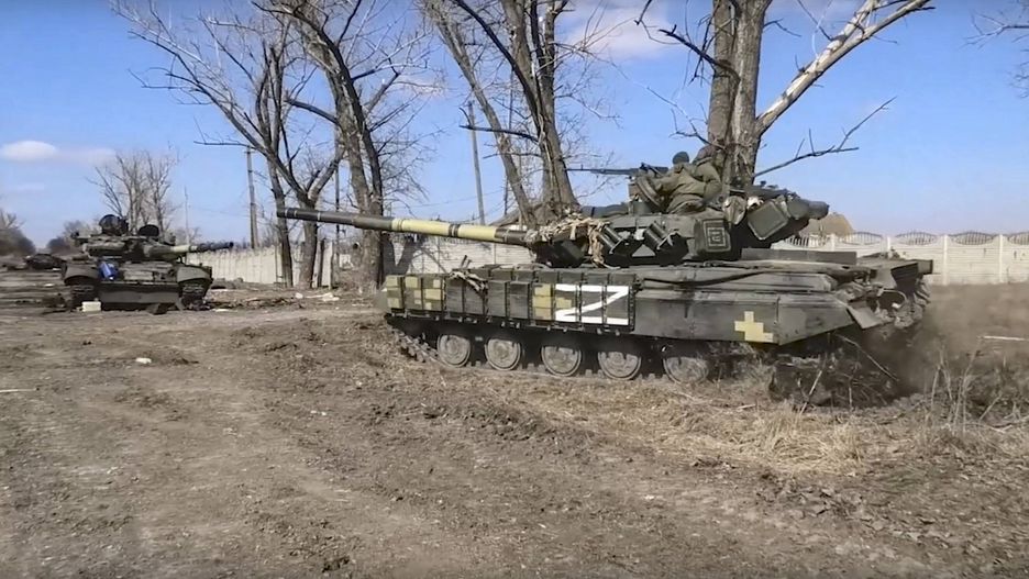 Military operation in Ukraineepa09829119 A handout still image taken from handout video made available by the Russian Defence ministry press-service shows militia of self-proclaimed DNR drives on a tank that was abandoned by Ukrainian army during their retreat in Donetsk region, Ukraine, 16 March 2022. On 24 February Russian troops had entered Ukrainian territory in what the Russian president declared a 'special military operation', resulting in fighting and destruction in the country, a huge flow of refugees, and multiple sanctions against Russia.  EPA/RUSSIAN DEFENCE MINISTRY PRESS SERVICE / HANDOUT  HANDOUT EDITORIAL USE ONLY/NO SALES Dostawca: PAP/EPA.RUSSIAN DEFENCE MINISTRY PRESS SERVICE / HANDOUT