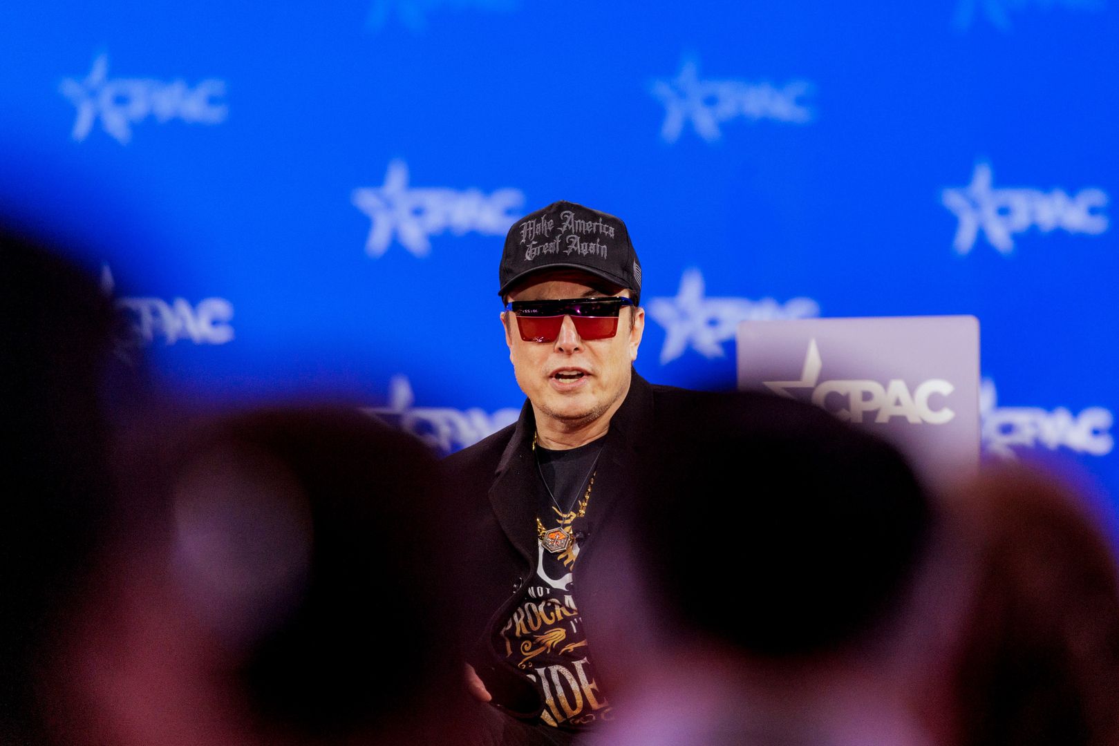 Elon Musk, chief executive officer of Tesla Inc., during the Conservative Political Action Conference (CPAC) in National Harbor, Maryland, US, on Thursday, Feb. 20, 2025. The Conservative Political Action Conference launched in 1974 brings together conservative organizations, elected leaders, and activists. Photographer: Jason C. Andrew/Bloomberg via Getty Images