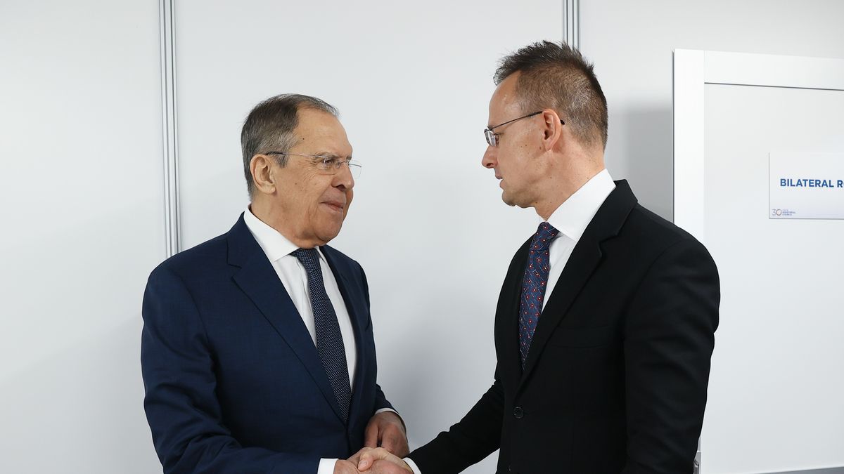 SKOPJE, NORTH MACEDONIA - NOVEMBER 30: (----EDITORIAL USE ONLY - MANDATORY CREDIT - 'RUSSIAN FOREIGN MINISTRY / HANDOUT' - NO MARKETING NO ADVERTISING CAMPAIGNS - DISTRIBUTED AS A SERVICE TO CLIENTS----) Russian Foreign Minister Sergey Lavrov (L) and hisHungarian counterpart Peter Szijjarto (R) meet as part of 30th Ministerial Council of the Organization for Security and Co-operation in Europe (OSCE) in Skopje, North Macedonia on November 30, 2023. (Photo by Russian Foreign Ministry / Handout/Anadolu via Getty Images)